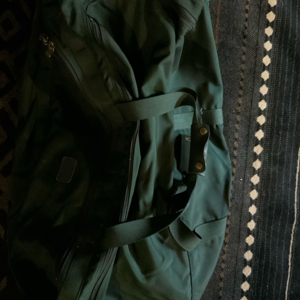 Tumi Green Duffel Bag